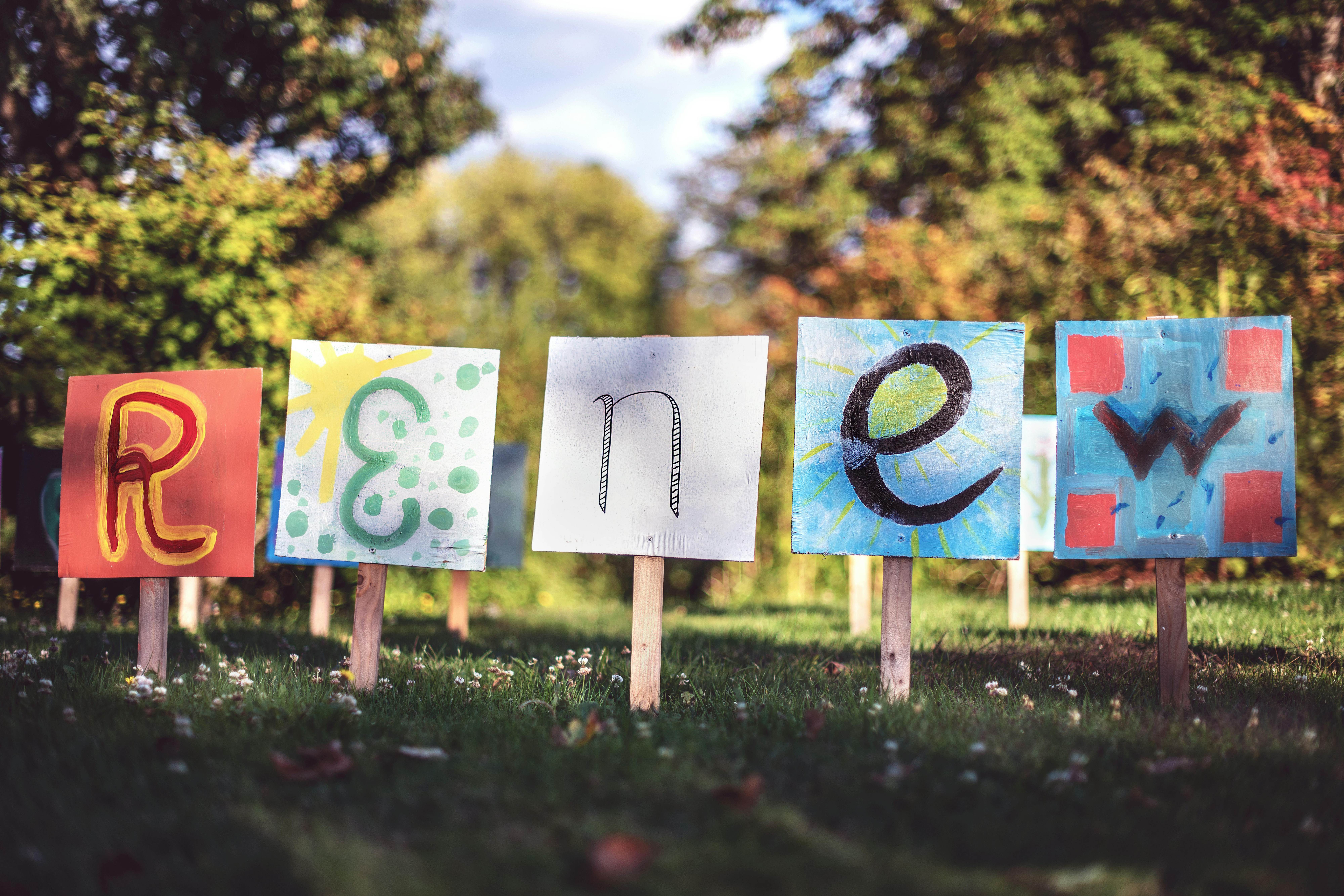 RENEW signs in a community project